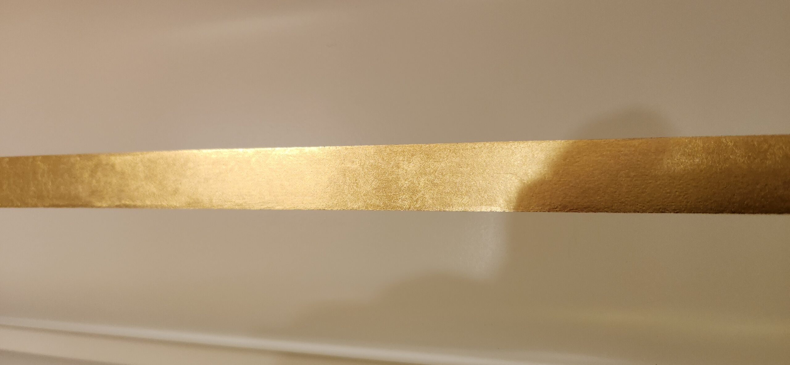 Linea de oro a la hoja